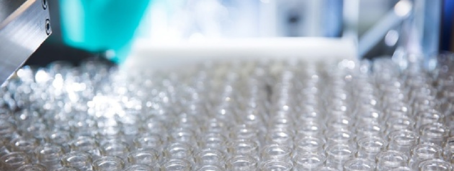 Steriline isolator in action for seamless vial filling in a sterile environment.